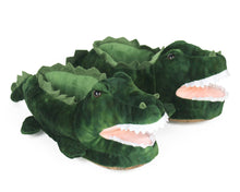 Load image into Gallery viewer, Pair of plush alligator slippers with green scaly textured plush, felt spines, tails, felt teeth, and four legs.