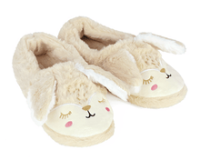 Load image into Gallery viewer, Pair of beige bunny slippers with embroidered faces and long ears on a white background