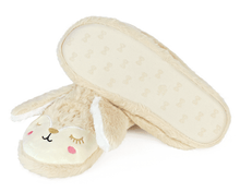 Load image into Gallery viewer, Pair of beige bunny slippers with embroidered faces and long ears on a white background, one slipper is turned upside-down to show the non-slip sole