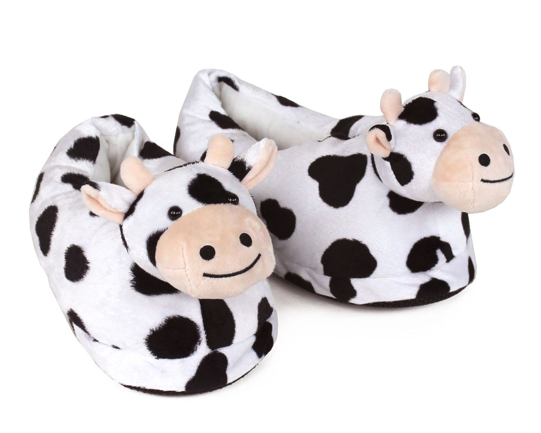 Cow-patterned slippers on a white background