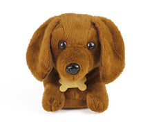 Load image into Gallery viewer, Brown plush dachshund dog slipper, close-up of face and paws, showing detail of gold bone-shaped collar tag 
