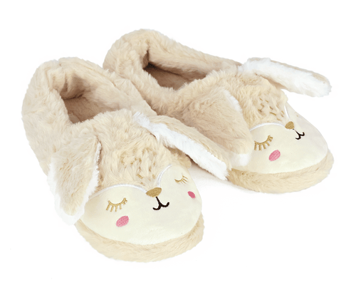 Pair of beige bunny slippers with embroidered faces and long ears on a white background