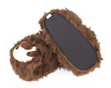 Load image into Gallery viewer, Pair of brown fuzzy sloth slippers with one upside-down showing the sole: black fabric with non-sip grips
