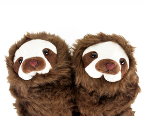 Pair of fuzzy sloth slippers close up showing details of face